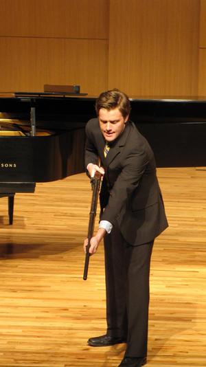 [Close-up of singer wearing a yellow tie at the Student recital during Jake Heggie's residency, 20]