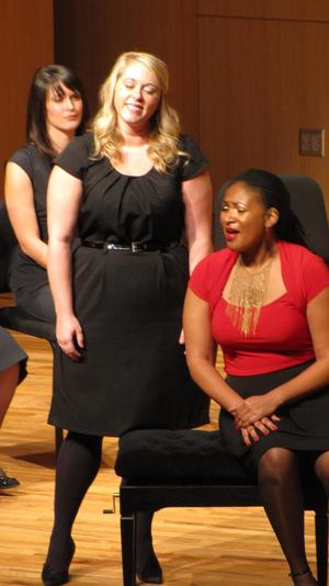[Close-up of two singers at the Student recital during Jake Heggie's residency, 2]