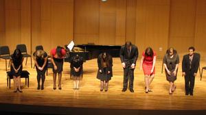 [Curtain call with nine singers and musicians at the Student recital during Jake Heggie's residency, 1]