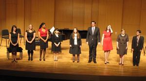 [Curtain call with nine singers and musicians at the Student recital during Jake Heggie's residency, 2]
