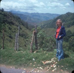 Primary view of object titled '[Lorena (Lori) Standing Near Manizales Highway]'.
