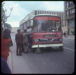 [People Boarding a Bus in Bogotá, Colombia]