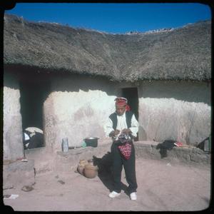 [A Man and a House at Taquile Island]