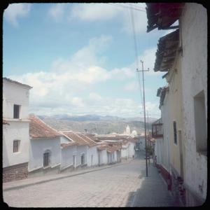 [A street lined by buildings in Sucre]