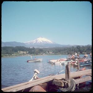 [Boats on a lake near the volcano Villarrica]