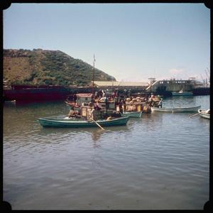 [Boats floating in front of a pier in Puerto Montt and Angelmó]