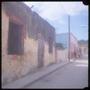 Primary view of [A Building on a Street in Mexico]