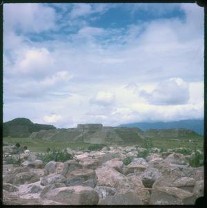 [A distant view of Monte Alban ruins, from rocks]