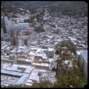[Aerial view of a city and mountains, 4]