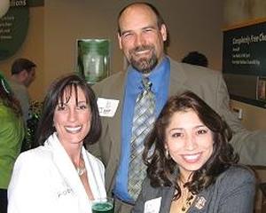 [Linda Maria Montalvo with man and woman at UNT event]