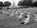 Thumbnail image of item number 1 in: '[AFROTC stretches in field]'.