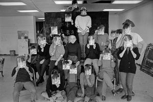 [A class group posing with Duane Michals, 3]