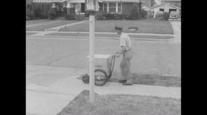 [News Clip: Pushcart postman delivers mail]