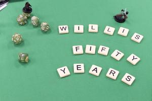 [Scrabble tiles, "Willis Fifty Years"]