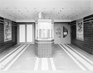 [The ticket booth and entrance at the Berry Street theater]