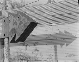 [An arrow sign at the Meadowbrook Drive-in]