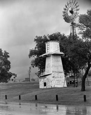 [Aermotor windmill and a wooden water tower]