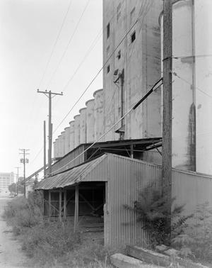 [A grain elevator and a shed]