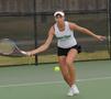 Photograph: [Kseniya Bardabush hits forehand during tennis match]