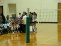 Primary view of [UNT volleyball team huddles on the sidelines during Tulsa match]