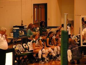 Primary view of object titled '[Cassie Headrick speaks to UNT volleyball players during UALR match]'.