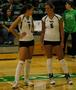 Photograph: [Catherine Coffey and Brooke Engel converse on the court]