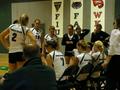 Primary view of [UNT volleyball team huddles during 2006 Sun Belt Conference, 5]