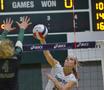 Primary view of [Hanna Forst spikes ball during Baylor match]
