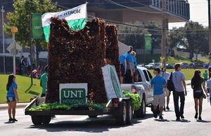 Primary view of object titled '[UNT Housing float at 2012 Homecoming Parade]'.