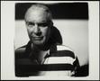 Photograph: [An unknown man in a striped polo shirt]