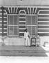 Photograph: [A man standing outside the Amtrack station in Fort Worth]