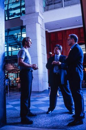[Mike Modano Conversing with Two Men]