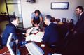 Photograph: [Mike Modano in an Office with Three Men]