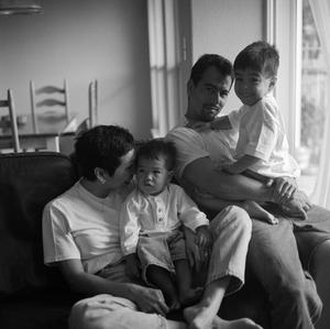 [Fred, Diana and their two sons on a couch, 2]