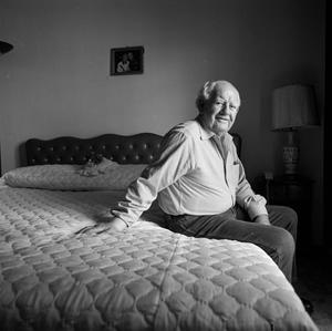 [Portrait of Man Sitting on a Bed, 2]