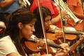 Thumbnail image of item number 1 in: '[Students play violin at 2013 Mariachi Aguilitas camp]'.