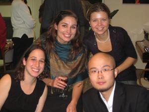 Primary view of object titled '[A group including Leah Greenfield, Lejing Zhou, and Sara Medkova lean down for a photo]'.