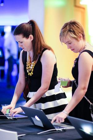 [Women use laptops at CEMIcircles 2013]