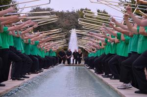 [Trombone students and trombone faculty posing atop a water pool, 3]