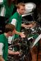 Thumbnail image of item number 1 in: '[Three people in green shirts playing drums, 2]'.