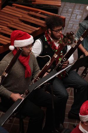 [Two men with tinsel playing bassoons, 1]