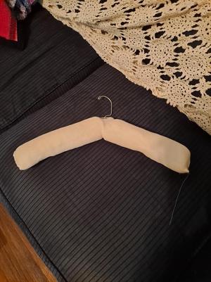 [Padded hanger made by Lexie Hobby]