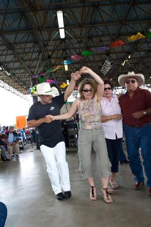 Primary view of object titled '[Dancers at Conjunto Festival]'.