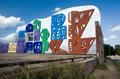 Thumbnail image of item number 1 in: '[Vibrant MADI Art Installation Adds Color and Playfulness to Marshall's Wood Building]'.