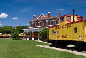 [Celebrating Railway History: Amtrak's Coach and Dining Car at Marshall's 1911 Texas and Pacific Railroad Depot]