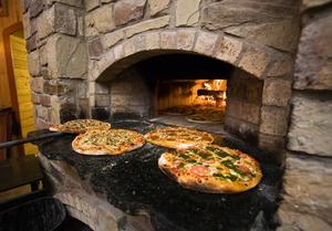 [Savoring Tradition: Wood-Fired Pizza at Ancient Ovens, Saint Jo, Texas]