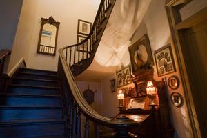 [Elegant Staircase of McClendon House: A Glimpse into Timeless Grandeur]