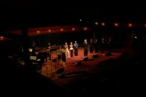 [Thirteen jazz singers performing onstage with musicians, 1]