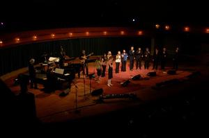 [Thirteen jazz singers performing onstage with musicians, 2]
