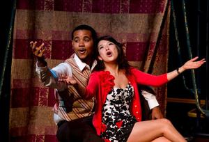 [Martin Clark, Jr. and Meng-Jung Tsai perform in "The Threepenny Opera"]